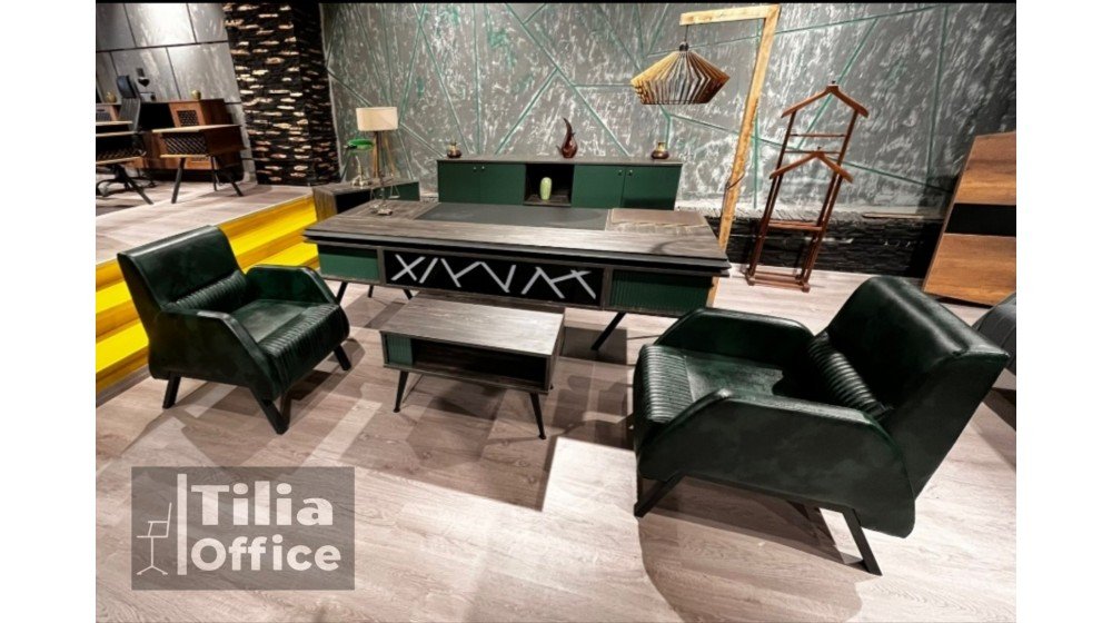 Zümrüt yönetici ofis paketi; ön paneli lazer kesim desenli ve led aydınlatmalı masa, yeşil balon kapak yüzeyler, Roth makam koltuğu ve V bekleme grubu.